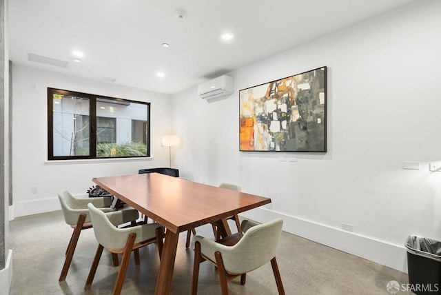 dining area with a wall mounted air conditioner