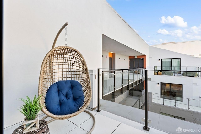 entrance to property featuring a balcony