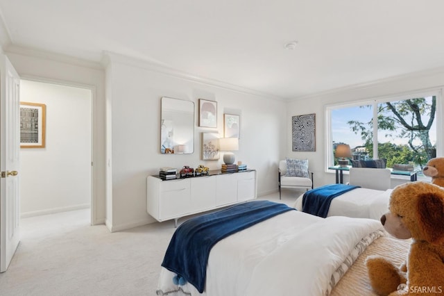 bedroom featuring crown molding and light colored carpet