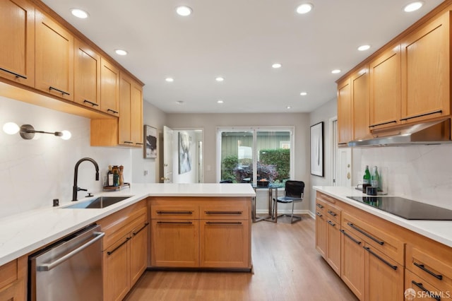 kitchen with sink, black electric stovetop, stainless steel dishwasher, kitchen peninsula, and light hardwood / wood-style flooring