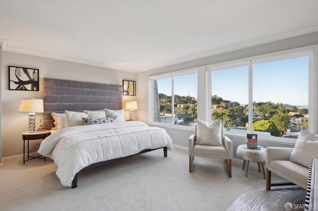 bedroom with crown molding and carpet flooring