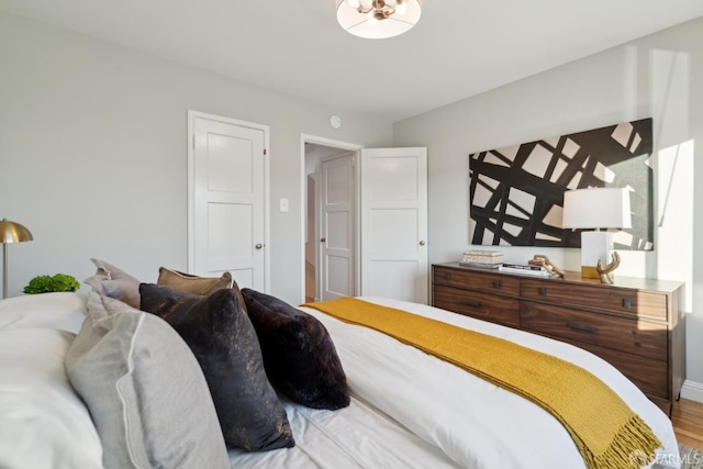 bedroom featuring hardwood / wood-style flooring