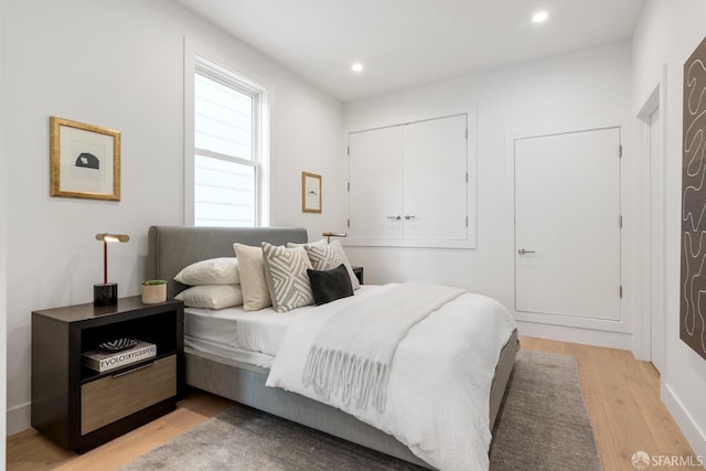 bedroom featuring light hardwood / wood-style floors