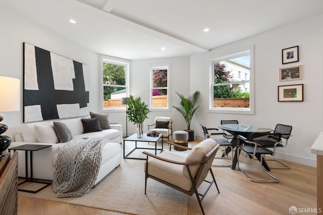 interior space featuring beamed ceiling and light wood-type flooring