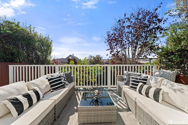 deck featuring outdoor lounge area