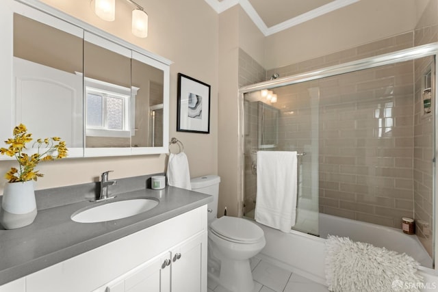 full bathroom with shower / bath combination with glass door, vanity, toilet, and crown molding