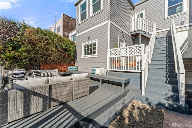 deck with an outdoor living space