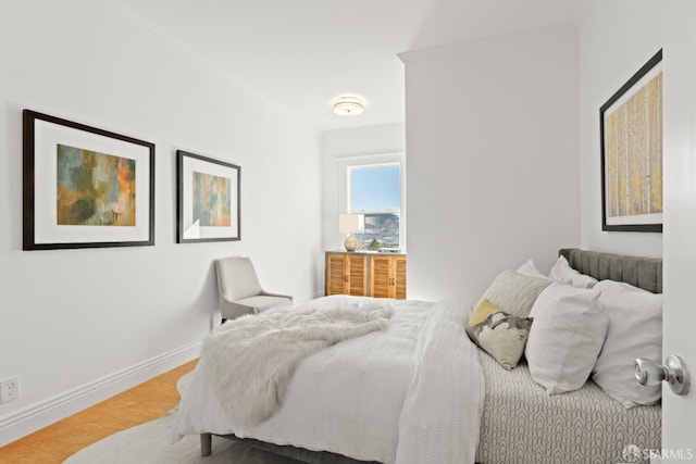 bedroom featuring wood-type flooring