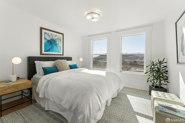 bedroom with light wood-type flooring