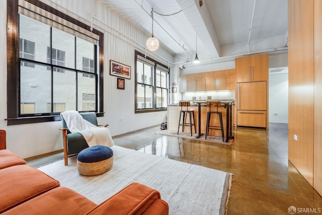 living room with concrete floors