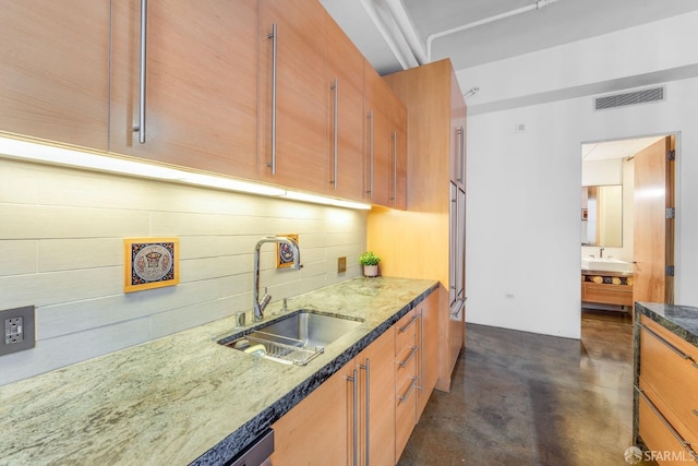 kitchen with tasteful backsplash and sink