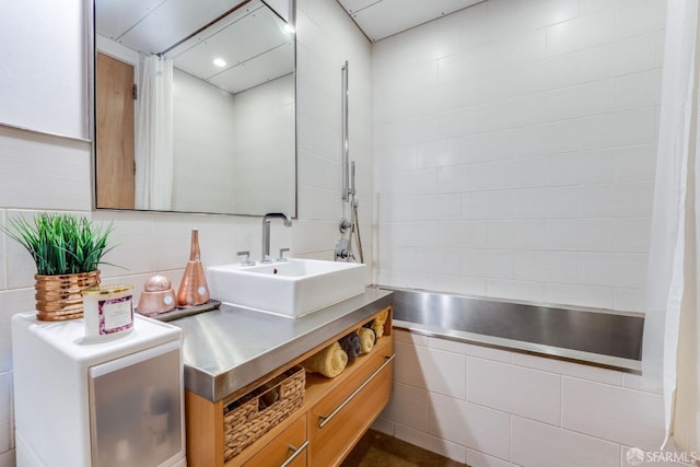 bathroom featuring sink and shower / bath combination with curtain