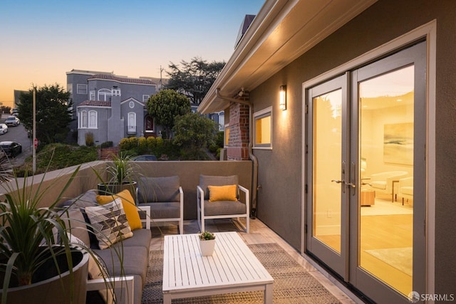 balcony with a patio and an outdoor hangout area