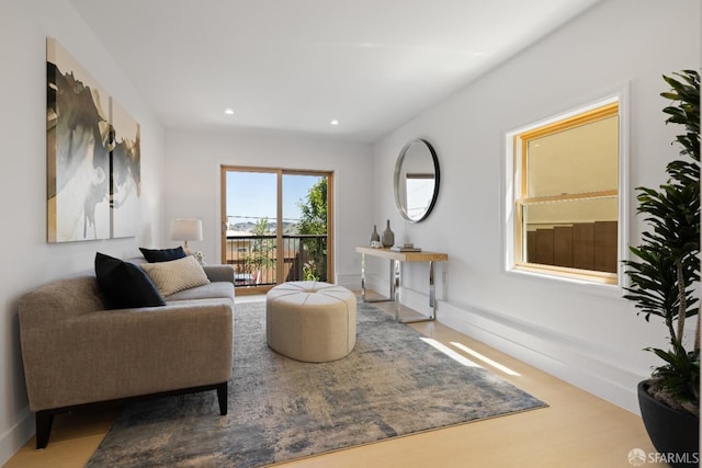 sitting room featuring recessed lighting