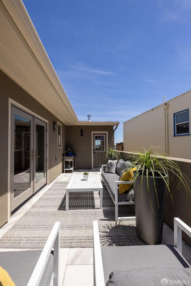 view of patio / terrace with french doors and an outdoor hangout area