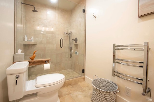 full bathroom featuring tile patterned floors, toilet, baseboards, and a stall shower