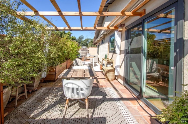 view of patio / terrace featuring fence