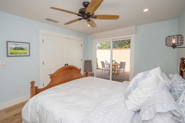 bedroom featuring visible vents, recessed lighting, light wood-style flooring, baseboards, and access to exterior