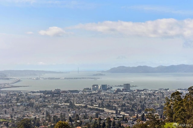 view of city with a water and mountain view