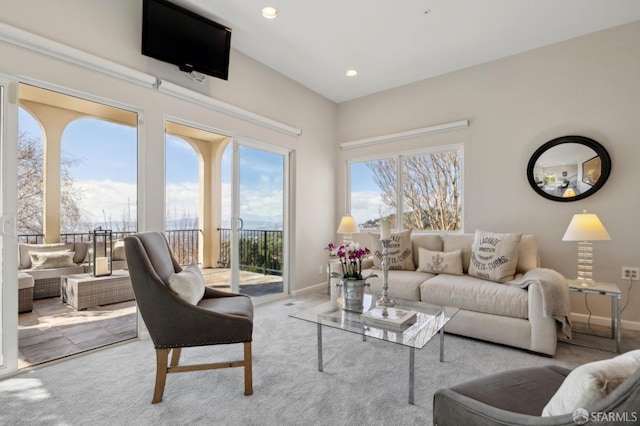 living area with recessed lighting, carpet, and baseboards