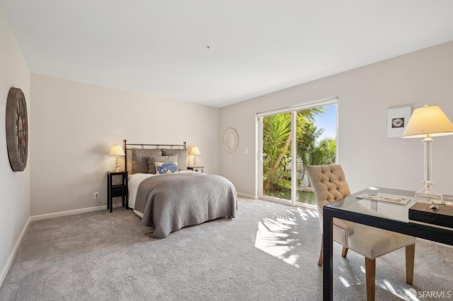 bedroom featuring carpet floors, access to exterior, and baseboards