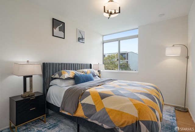 1520 Ofarrell St Unit 4, San Francisco, CA 94115 - bedroom with wood finished floors and baseboards
