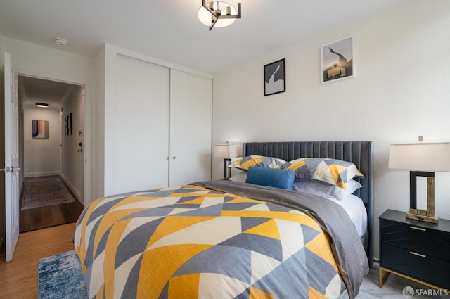1520 Ofarrell St Unit 4, San Francisco, CA 94115 - bedroom with a closet and wood finished floors