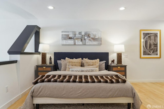 bedroom featuring hardwood / wood-style flooring