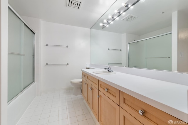 1843 Sutter St Unit 301, San Francisco, CA 94109 - full bathroom featuring vanity, toilet, baseboards, combined bath / shower with glass door, and tile patterned floors