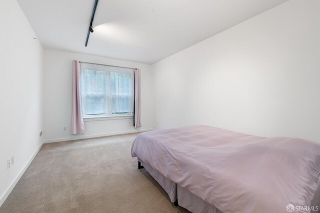1843 Sutter St Unit 301, San Francisco, CA 94109 - bedroom with carpet flooring, track lighting, and baseboards