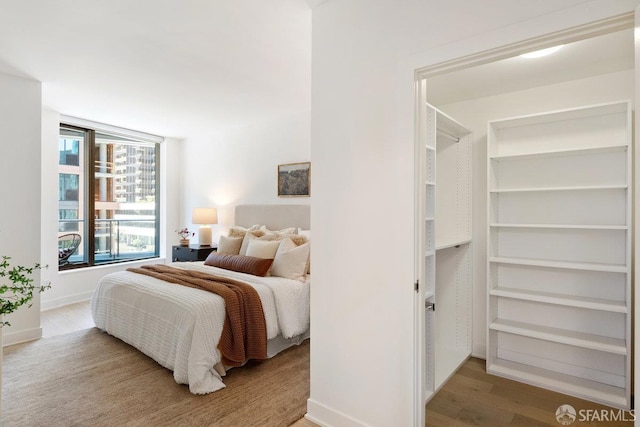 318 Main St Unit 4E, San Francisco, CA 94105 - bedroom with wood finished floors and baseboards