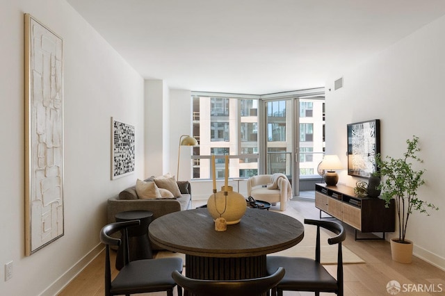 318 Main St Unit 4E, San Francisco, CA 94105 - dining room featuring light wood-style flooring and baseboards