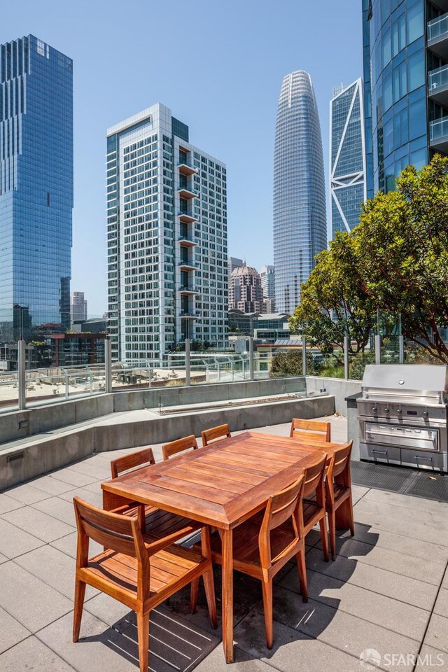 318 Main St Unit 4E, San Francisco, CA 94105 - view of patio / terrace featuring outdoor dining space, a grill, and a skyline view