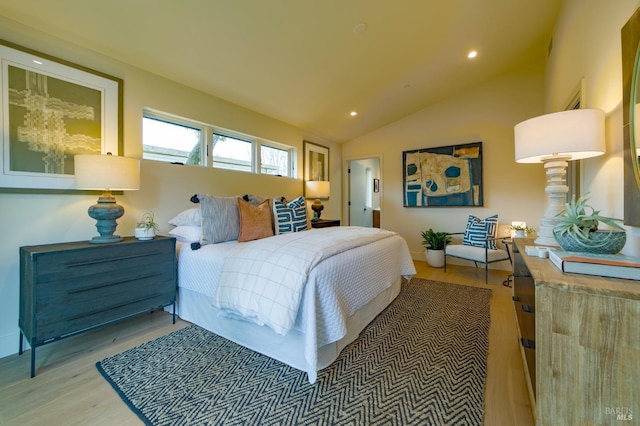 bedroom with recessed lighting, light wood-type flooring, and lofted ceiling