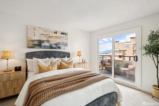 855 La Playa St Unit 360, San Francisco, CA 94121 - carpeted bedroom featuring access to exterior and a textured ceiling