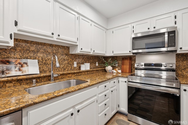 855 La Playa St Unit 360, San Francisco, CA 94121 - kitchen with appliances with stainless steel finishes, white cabinets, and stone countertops