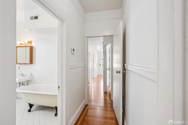 3046-3048 Polk St, San Francisco, CA 94109 - hallway featuring wood finished floors and baseboards