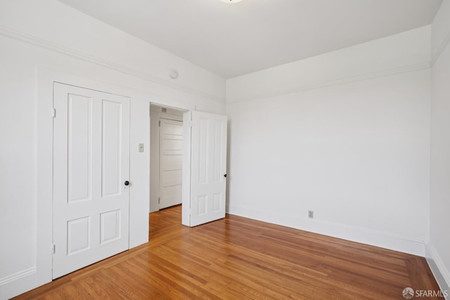 3046-3048 Polk St, San Francisco, CA 94109 - unfurnished bedroom with light wood-style flooring and baseboards