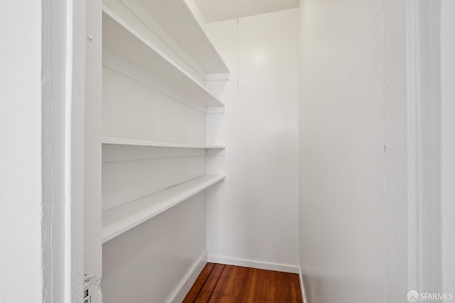 3046-3048 Polk St, San Francisco, CA 94109 - walk in closet featuring dark wood-type flooring