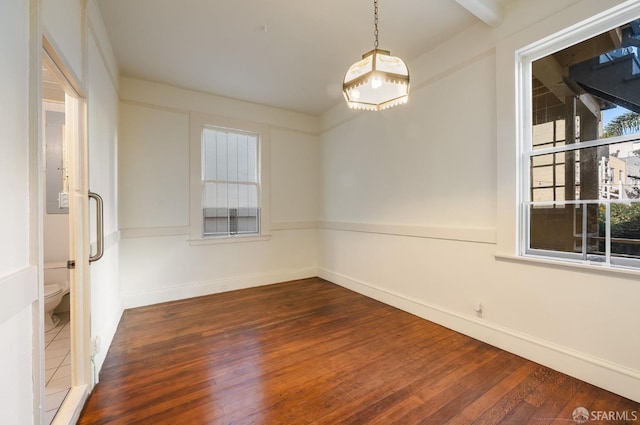 3046-3048 Polk St, San Francisco, CA 94109 - empty room with dark wood-style floors and baseboards