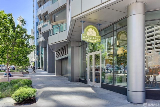 property entrance featuring french doors