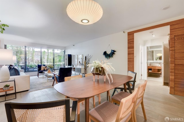 dining room with light wood-type flooring