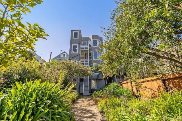 view of front of house with fence