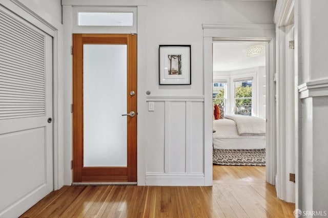 foyer entrance featuring wood-type flooring