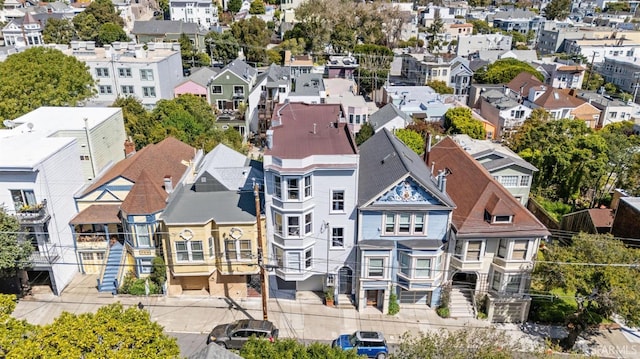birds eye view of property with a residential view