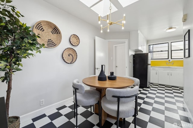 dining space featuring a chandelier