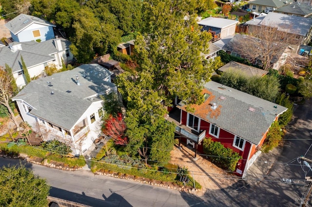 birds eye view of property with a residential view