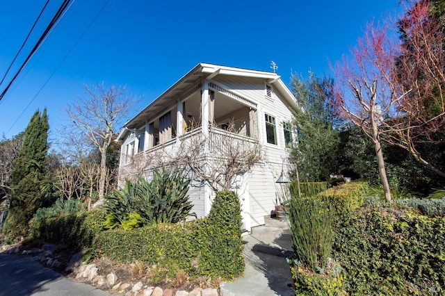 view of home's exterior featuring a balcony