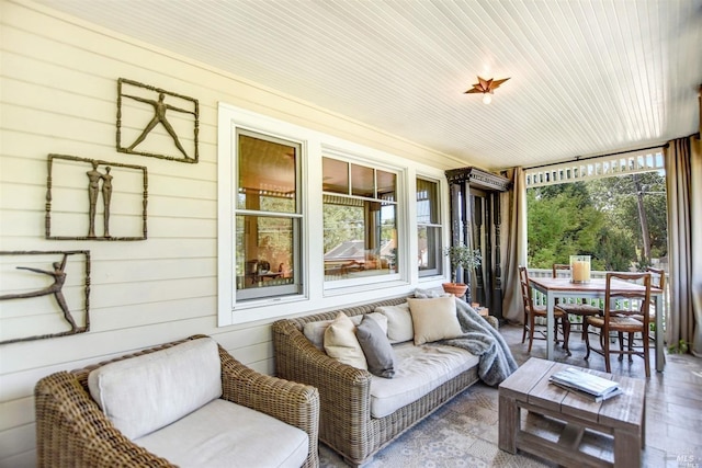 sunroom featuring wooden ceiling