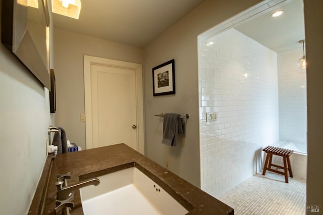 bathroom with recessed lighting and vanity